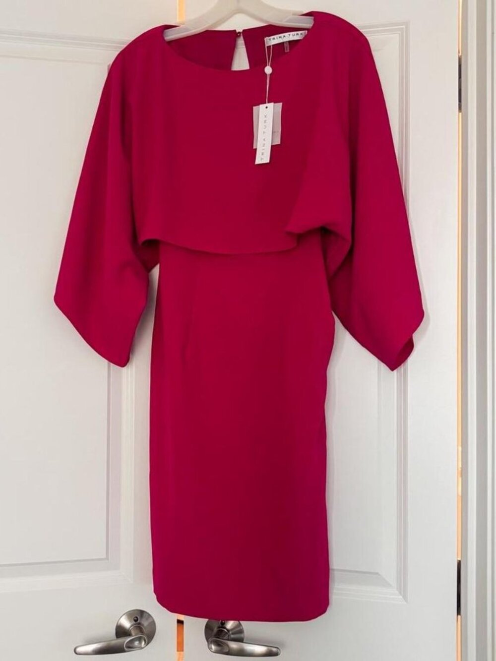 Trina Turk “Shalee” overlay sheath dress in a vibrant pink